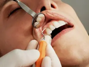 woman getting dental exam