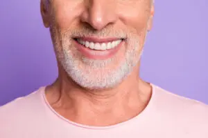 man with nice smile dental filling concept