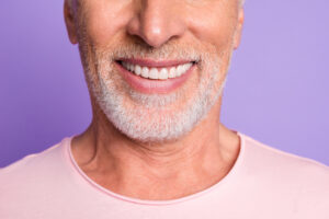 man with nice smile dental filling concept